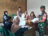 Bhabinkamtibmas Polsek Cihaurbeuti Kawal Penyaluran Bantuan Ketahanan Pangan di Desa Sukasetia